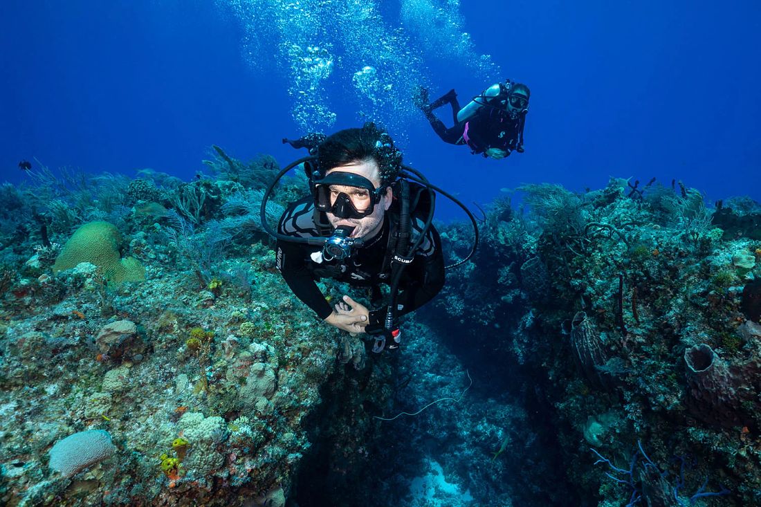 Two SCUBA divers underwater